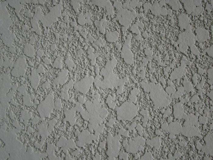 parede cinza com textura projetada